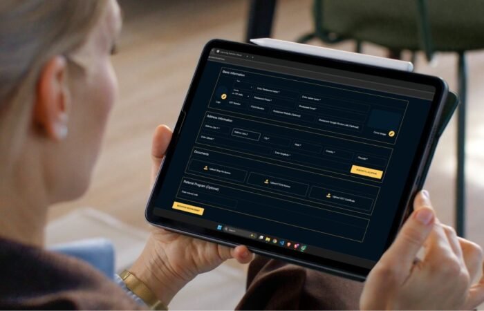A registers Your restaurant on Etable using a tablet, filling out basic details for POS, digital menus, and QR ordering.